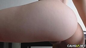 Amateur girl masturbates intensely on webcam in solo softcore session