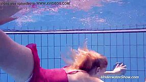 Proklova removes bikini for underwater swim in pool bathing scene