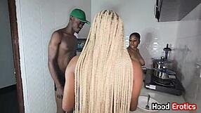 Two cute african girls are getting banged hard on the kitchen slab with monster cocks 😍