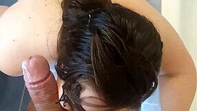 Busty slut wife enjoys a thick cock deep in her throat in the bathroom.