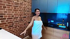 brunette babe fucks dildo to orgasm at breakfast