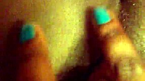 Watch this ebony beauty finger her pretty pussy in close-up masturbation frenzy!