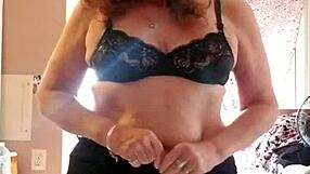 she applies lotion to her mature skin.