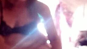 she applies lotion to her mature skin.