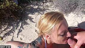 blonde skinny tattooed girl swallows cum on fuerteventura beach