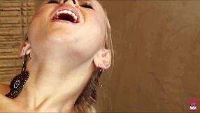 her slender feet grip his raging hard on before he takes her in the bathroom