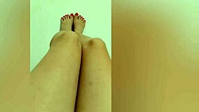 The shy petite 18+ hottie revealed her sexy legs with red pedicure for a footjob.