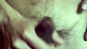 The gay man plays with his navel and cums in this solo scene