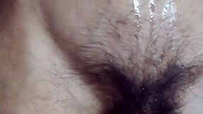 The gay man plays with his navel and cums in this solo scene