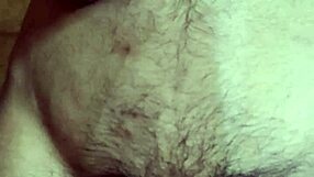 The gay man plays with his navel and cums in this solo scene