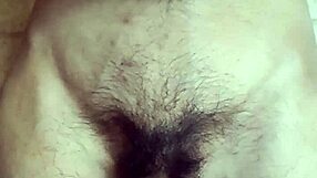 The gay man plays with his navel and cums in this solo scene