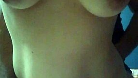 young guys standing and playing in their house