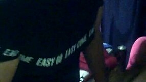 young guys standing and playing in their house