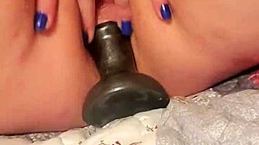 The ass plug gets inserted and works hard