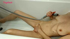 Young MILF showers while boyfriend films her small tits!