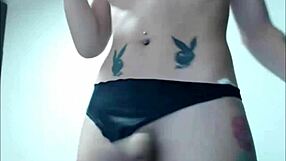 Sexy inked tranny performs hot solo masturbation