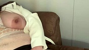 Beautiful brunette milf minxycme moans while sucking dildo in homemade lesbian scene.