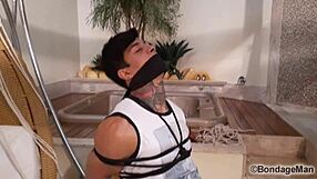 Is the muscular Brazilian guy tied up and gagged in this audition?