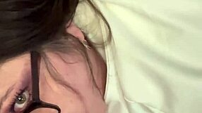 Beautiful brunette milf minxycme moans while sucking dildo in homemade lesbian scene.