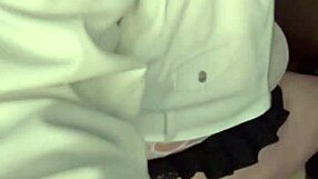 Beautiful brunette milf minxycme moans while sucking dildo in homemade lesbian scene.