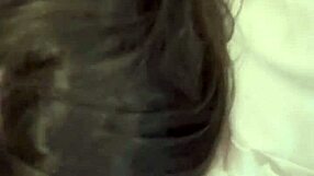 Beautiful brunette milf minxycme moans while sucking dildo in homemade lesbian scene.