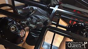 queen dominatrix frida cage locks desires in bdsm fetish chastity play.