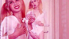 In a steamy Asian setting, a crossdressing tgirl with small tits gets oiled up for solo masturbation.