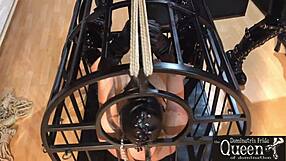 queen dominatrix frida cage locks desires in bdsm fetish chastity play.