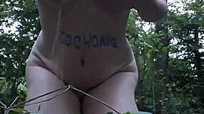 Female slave indulges in outdoor self-pleasure in the forest on August 14, 2023