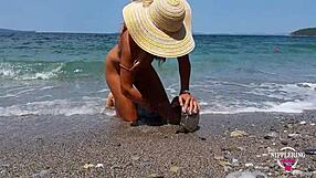 nippleringlover shows huge pussy piercings on nude beach