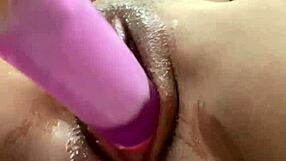 Petite babe intensely pounds her tight pussy with a close-up dildo view