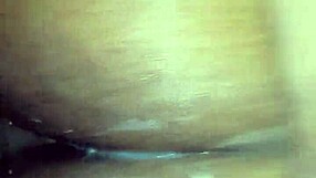 Close up of an amateur couple having sex in a doggy style position