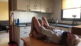 Mature couple fucks passionately in the kitchen with oral and doggystyle