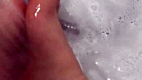 Nylon removal leads to a steamy shower scene with feet.