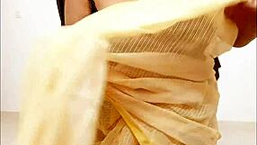 Look at this chubby Asian aunt showing her big tits and boobs.