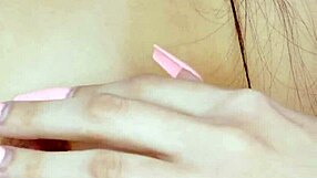 Alluring closeup of nude brunette's sex appeal on sofa