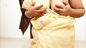 Look at this chubby Asian aunt showing her big tits and boobs.