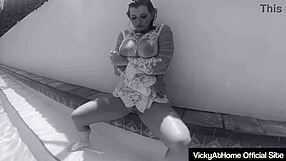 Big boobed blonde Vicky Vette masturbates her big clit with a dildo in the pool.