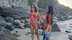 Two latinas seduce guy on beach for hardcore fun