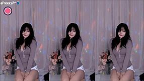 cute korean girl dances and shows her big tits