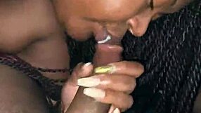 Ebony BBW performs sloppy deepthroat on big black cock.