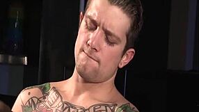 Two cute gay strippers engage in bareback fucking