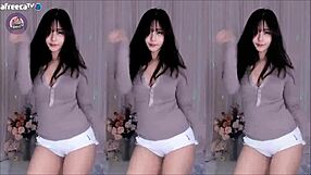 cute korean girl dances and shows her big tits