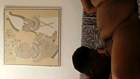 BBW Roxy sucks a hard cock with shaved pussy on display.