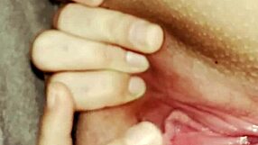 She stretches her fat pussy under covers for clit orgasm.