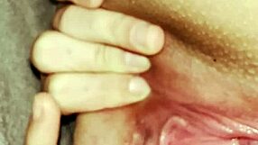 She stretches her fat pussy under covers for clit orgasm.