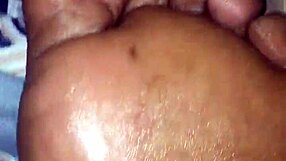 my girlfriend gives me a footjob in the bedroom