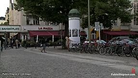 Public display of a blonde bondage and choking scene