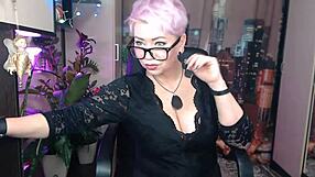 Juicy Russian MILF AimeeParadise performs an immodest striptease dance in sexy stockings, showcasing her big tits