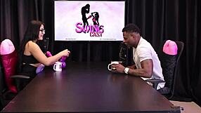 Gostosa loses the jerk-off game and removes her shirt to show her big breasts in sheer red lingerie with will mastro